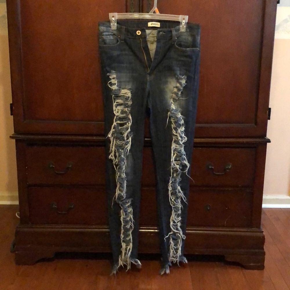 Distressed blue jeans